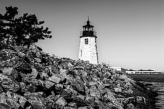 Newport Harbor Light Along Rock Jetty -BW